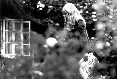 Marianne Faithfull with newspaper