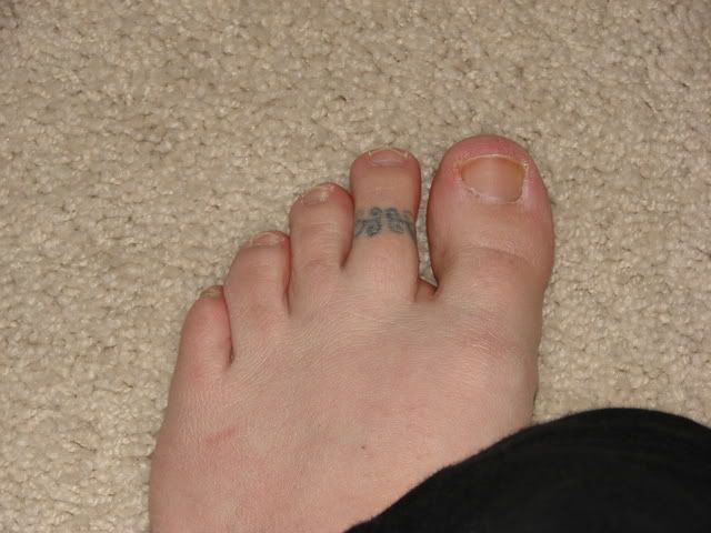 Anyone have a Toe-Ring Tattoo?? How 'bout top of foot?